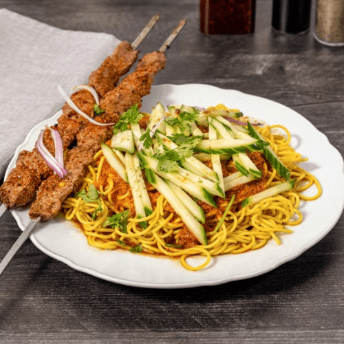 Cold sesame noodles with two lamb kebabs.